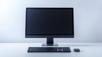 Close-up of a desktop computer setup against a clean white backdrop.