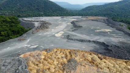 Huge open mine at the brink of the rainforest in Brazil
