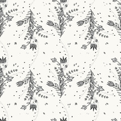 Intricate monochrome floral pattern featuring hand-drawn tulips and leaves in Scandinavian folk style. Delicate grey and black motifs flow harmoniously for a whimsical, elegant look.