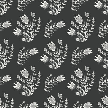Monochrome floral pattern features delicate white tulips and intricate foliage on a dark background. Modern, elegant, and refined, it evokes sophistication and timeless black-and-white beauty.