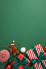 Colorful vertical Christmas presents and decorations on green background, featuring gingerbread man, festive ribbons, and ornaments to celebrate the holiday season