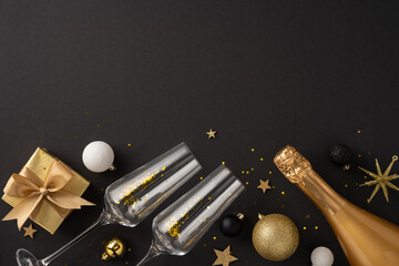 A classy top view new year celebration setup with champagne, two glasses, a gift box, and sparkling...
