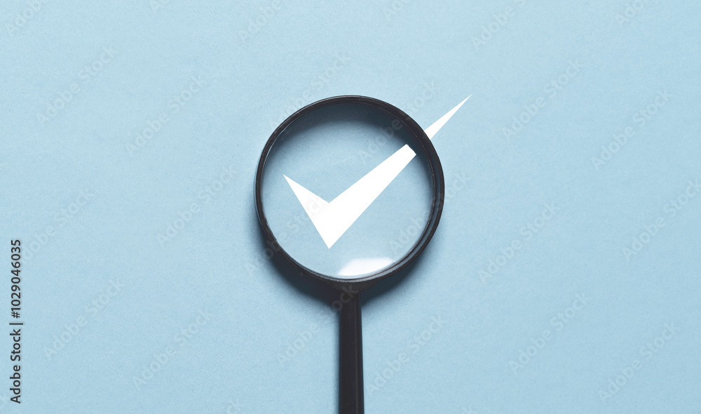 Poster white correct sign mark inside of magnifier glass for focus on project and document approval concept