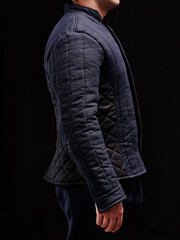 Historical fashion. Medieval knight cloth. Padded jacket gambeson.
