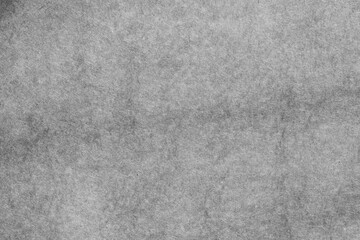 Rough dark grey grains paper texture