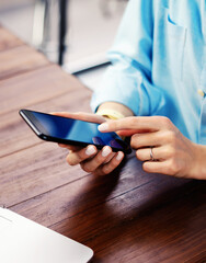 Woman pointing on smartphone screen, chatting in social networks, meeting website, searching...