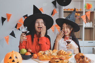 friendship, holiday and people concept - group of happy smiling friends in halloween costumes of...