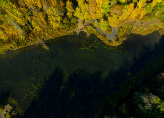 A view of a lake with trees in the background