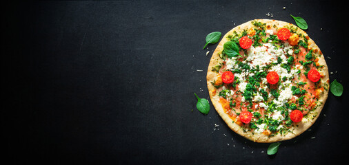 Crispy spinach pizza with ricotta, mozzarella and tomatoes