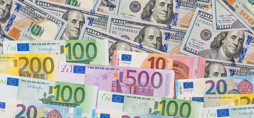 mix dollar and euro bills. background. money.