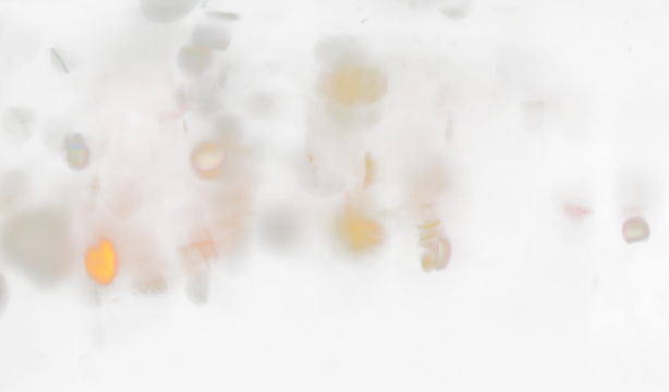 Blurred lights create an abstract colorful transparent background.