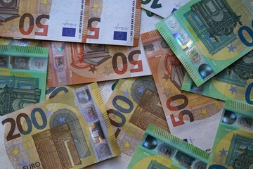 Different large Euro banknotes seen from above