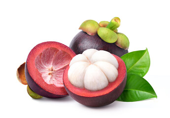 Mangosteen with cut in half and leaves isolated on white background.