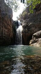Naklejka premium Majestic waterfall cascading into a pool below, 4K hyperrealistic photo