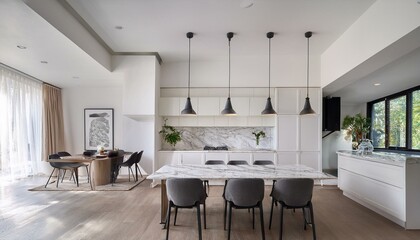 Minimalist modern interior design of kitchen with white marble stone island, dining table and chairs.