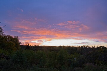 Magical sunset in winter in January over Bredebolet in Skaraborg in Vaestra Goetaland in Sweden on a cold day