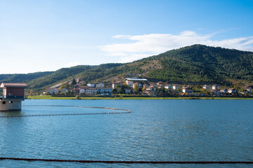 a lake with a small house on the shore .Nagore, Arce Valley, navarra