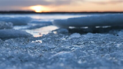 Ice on the sea at sunset. Freezing/melting sea.