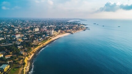 Fototapeta premium Aerial View of a City Skyline along a Coastal Shoreline