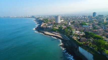 Aerial View of a Coastal City with a Blue Ocean
