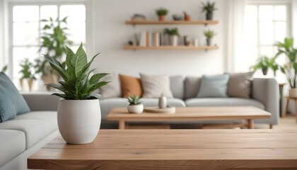 A wooden table in a cozy living room with a potted plant, a vase, and a blurred background of shelves and decor 