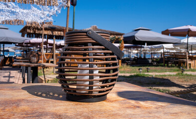 decorative candlestick with candle in street bar