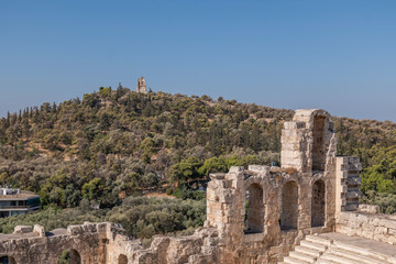 greece capital athens and acropolis ancient artifacts touristic points of interest daytime and sunset light