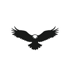 Naklejka premium A black silhouette of a large eagle with outstretched wings against a white background 