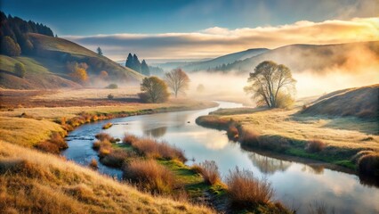 Foggy morning valley with river and hills, withered grass
