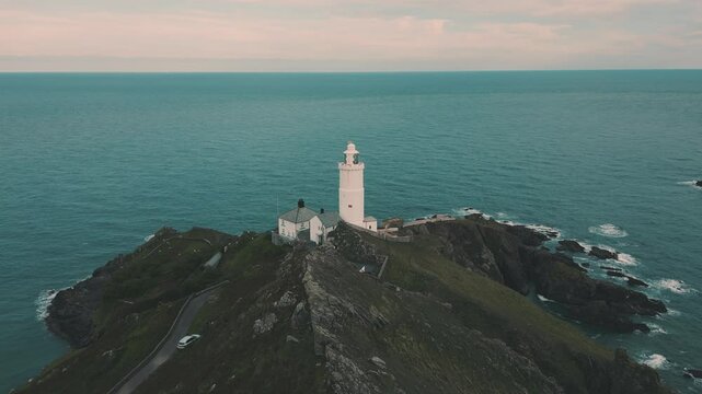 Aerial view of clifftop lighthouse 