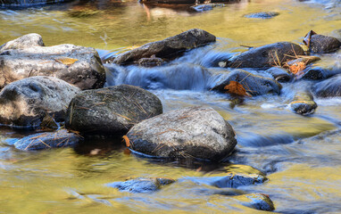 quinapoxet river cascading   towards  the wachusett  reservoir