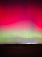 Stunning, dreamy display of vivid colors seen from aurora borealis, northern lights over Long...