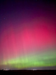 Stunning, dreamy display of vivid colors seen from aurora borealis, northern lights over Long...
