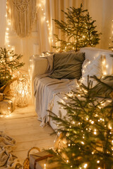Interior bedrooms in Scandinavian style, decorated for the Christmas holidays. Live ate in the interior.