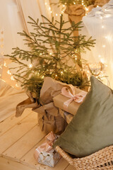 Designer Christmas tree decoration with light decorations. The concept of celebrating New Year and...
