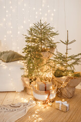 Interior bedrooms in Scandinavian style, decorated for the Christmas holidays. Live ate in the interior.
