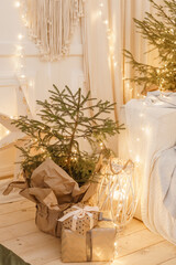 Designer Christmas tree decoration with light decorations. The concept of celebrating New Year and...