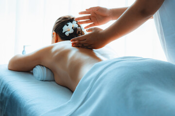 Caucasian woman customer enjoying relaxing anti-stress spa massage and pampering with beauty skin...