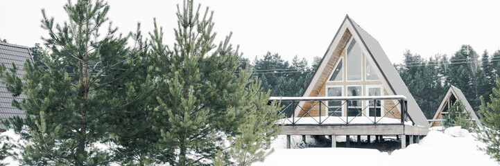 A country house in nature in winter. Rest in an ecologically clean place in winter. Glamping in nature.