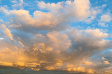 Sunset sky landscape with vivid orange and pink clouds, picturesque vast sunset sky landscape