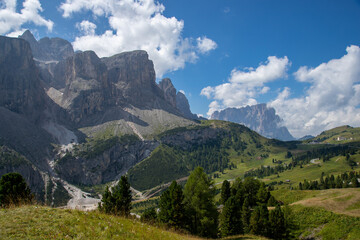 Fototapeta premium Sassolungo mountain, Gardena Pass and Sella Group view from Alta Badia valley on a sunny day, Dolomites, Trentino, Alto Adige, Italy