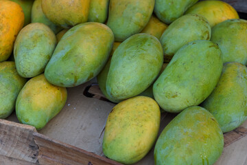 Fresh mangoes sold by roadside vendors in Lubuklinggau City, Indonesia.
