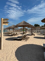 beach chairs and umbrellas