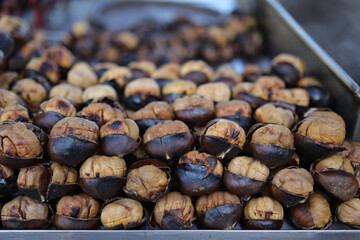 Roasted street chestnuts and corn at a street stall. selling fried corn and chestnut outdoor in Istanbul, Turkey