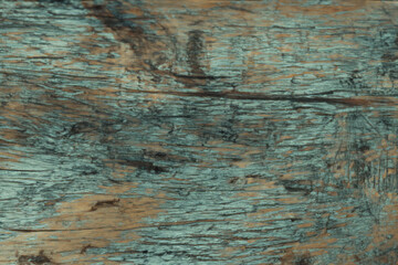 Obraz premium Weathered teal-tinted wood texture for rustic and vintage designs