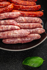 raw meat sausages beef, pork, chicken, lamb, dish fresh delicious gourmet food background on the table rustic food top view copy space