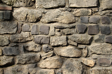 Old wall built of natural stone