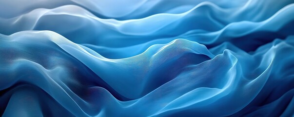 Obraz premium A serene wave of blue fabric, beautifully flowing and creating a calming visual effect, perfect for backgrounds or artistic designs.