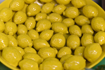 Lemon background. Ceramic tableware with lemons