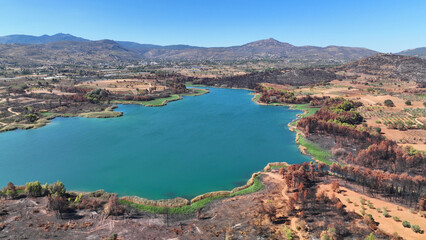 Aerial drone photo of lake and dam of Marathon after mega fires of Athens in August 2024, Attica, Greece